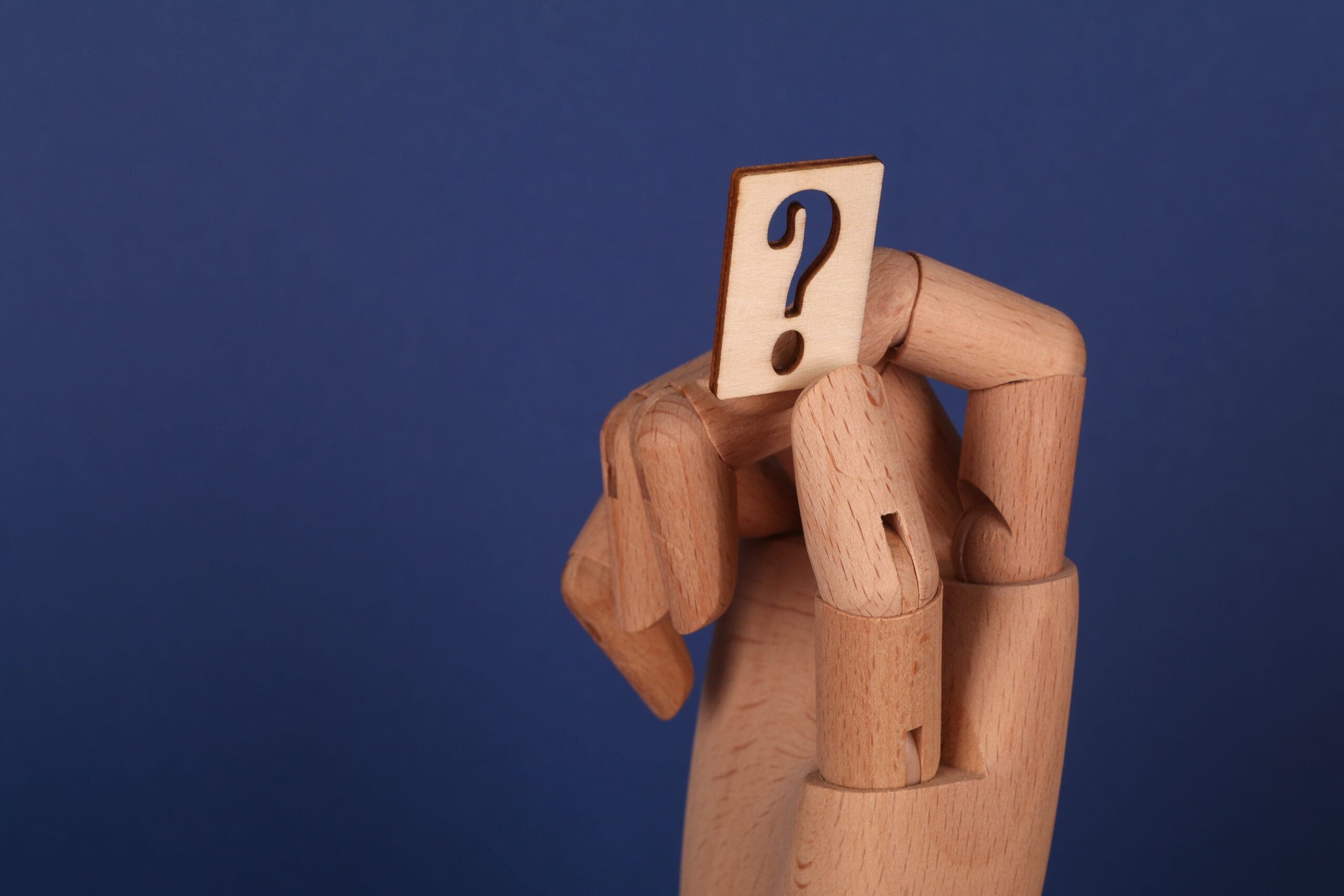 hand holding a question mark