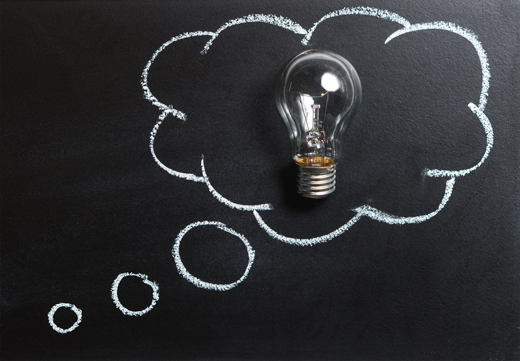 light bulb in a thinking cloud